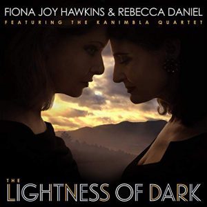 https://staging.bluewolf-reviews.com/music/the-lightness-of-dark/
